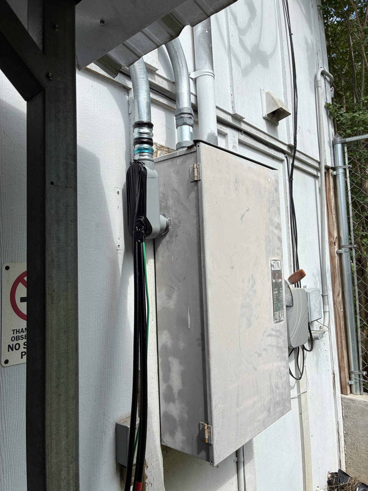 Completed AC disconnect and conduit runs