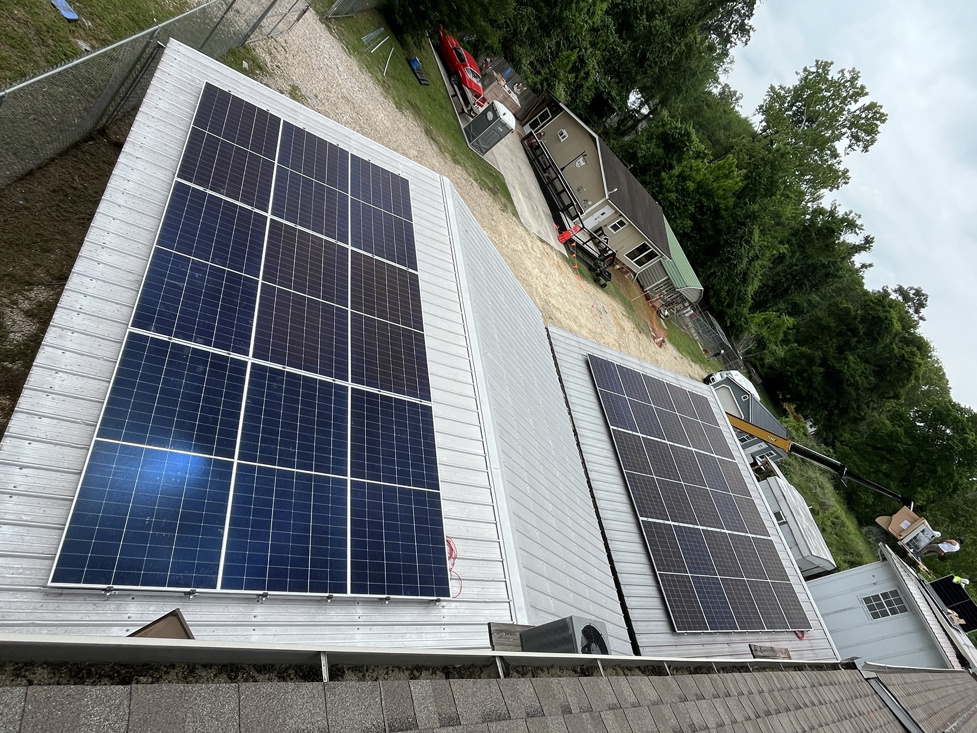Completed Solar Arrays D and E on adjacent shelter rooftops