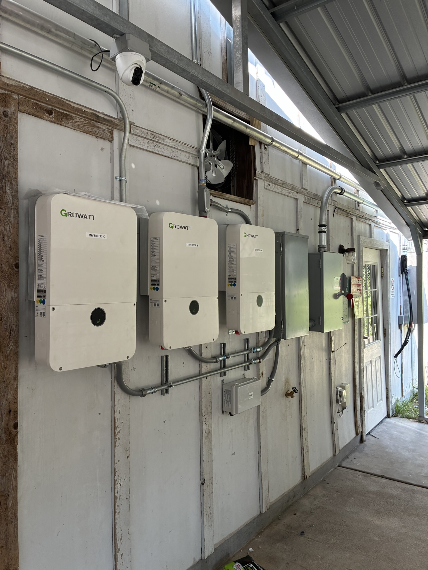 Growatt inverters A, B, and C with AC disconnect enclosures