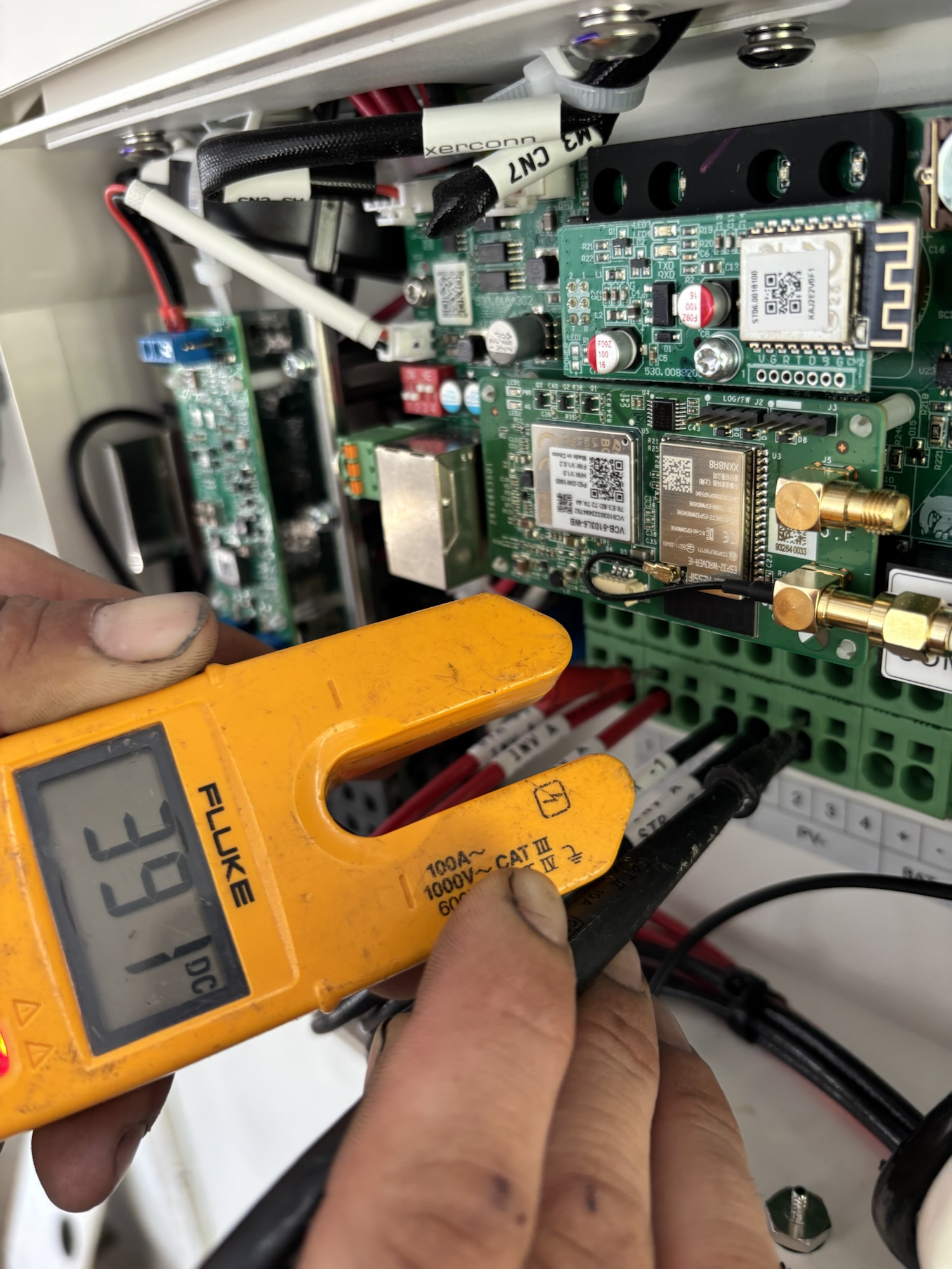 Fluke clamp meter reading DC voltage inside inverter combiner
